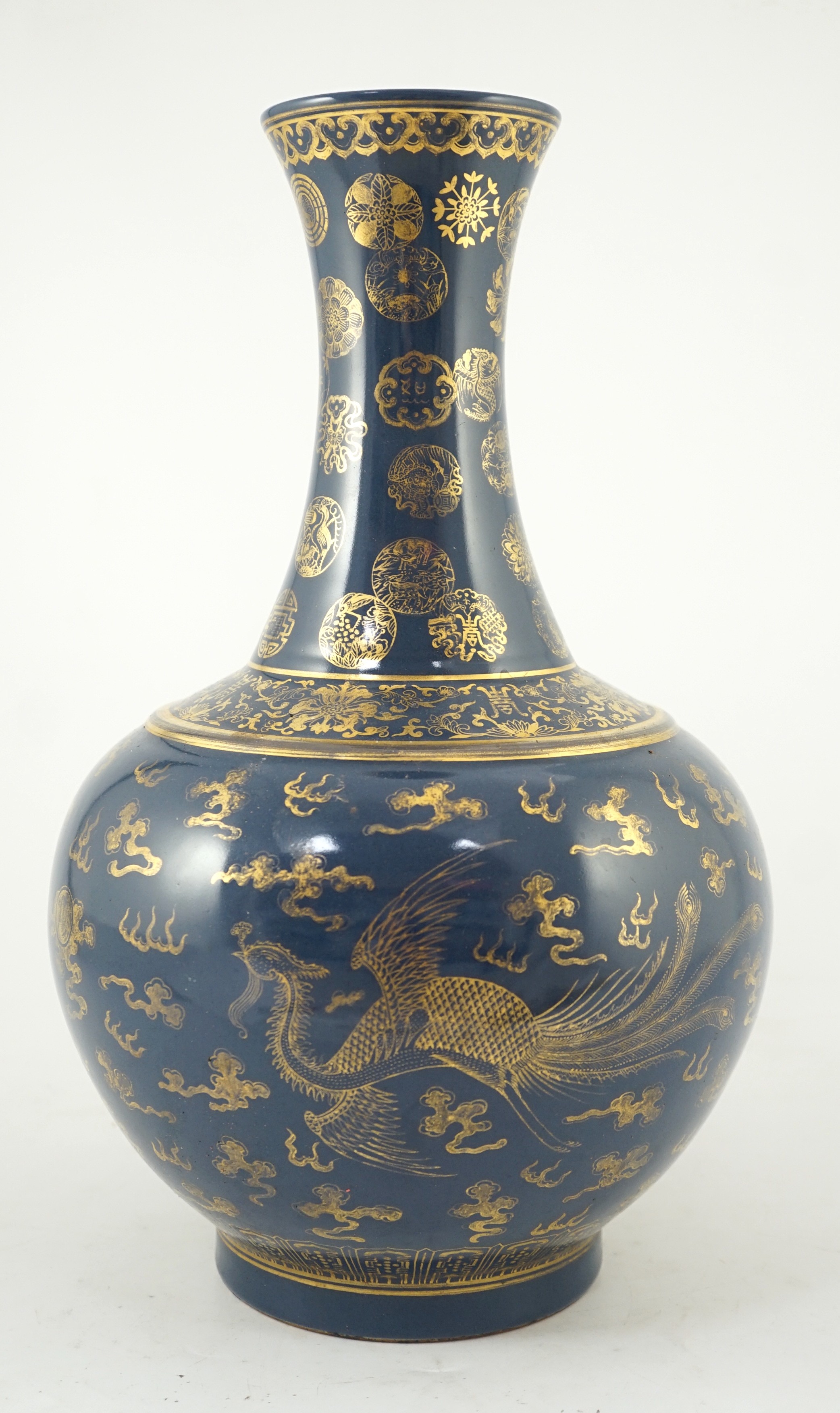 A Chinese gilt decorated blue ground ‘dragon’ vase, Guangxu mark but later, 38.5cm high, wear to gilding